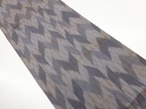 ふくれ織幾何学模様織出し全通洒落袋帯